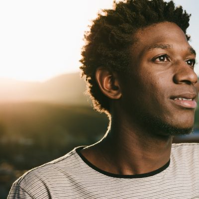 Portrait of a young brazilian man at sunset.